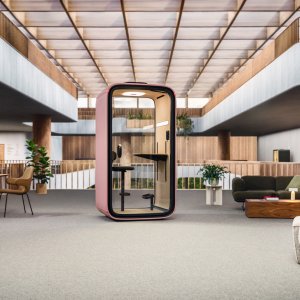 Framery One Pod mit Sitz-Steh-Schreibtisch im deutschen Büro